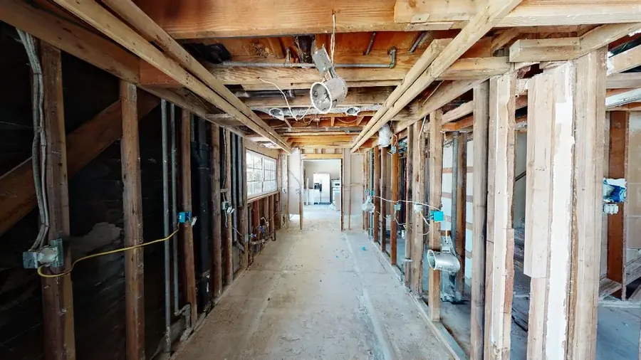 San Marino home opened to the framing and dried after storm water damage